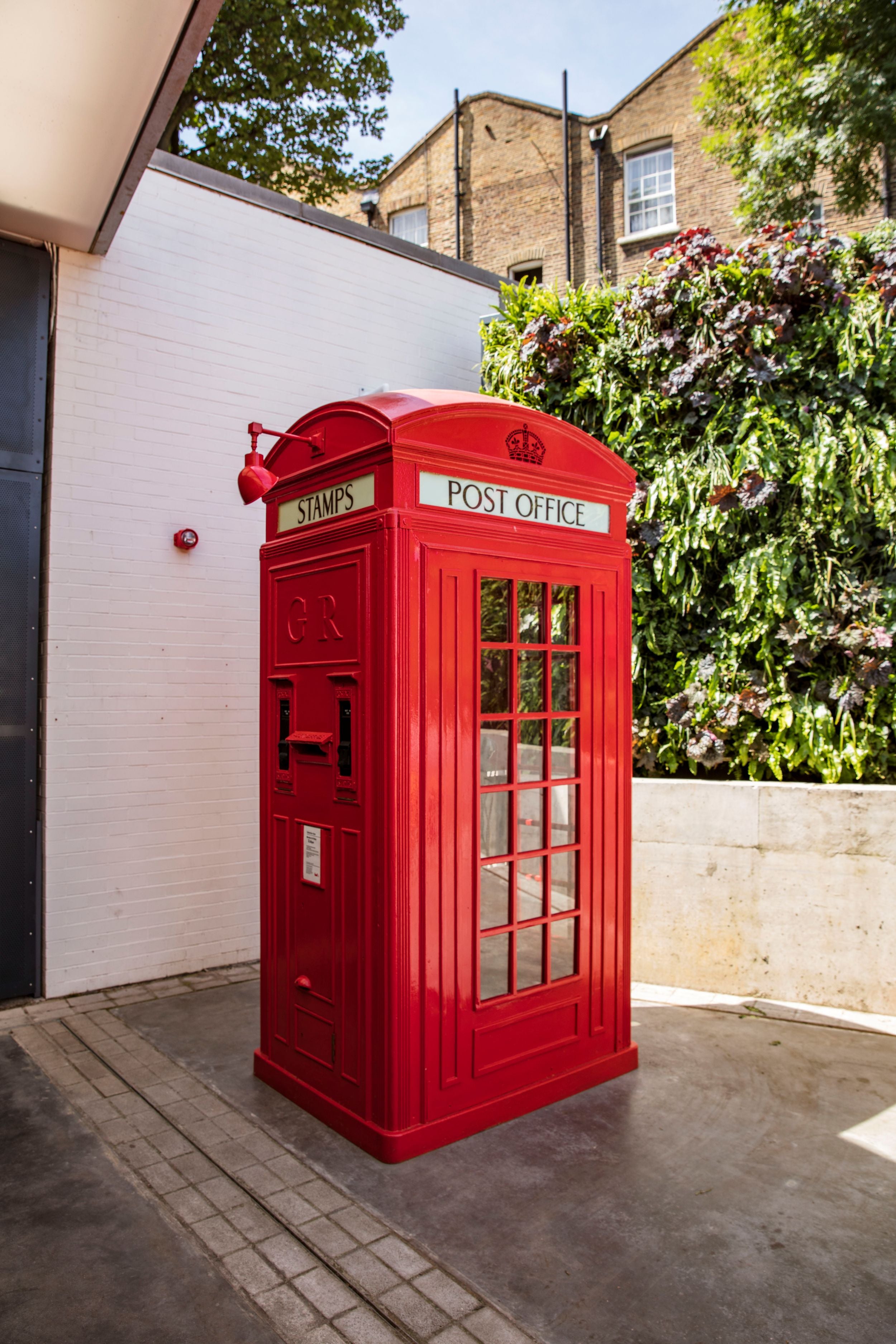 Postbox in the museum courtyard Postcard