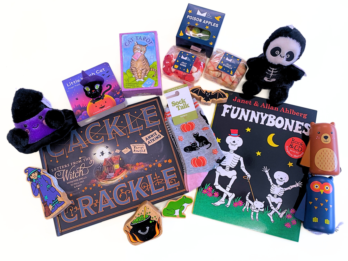 Collection of products in the Halloween shop range including books, sweets, plush toys and torches