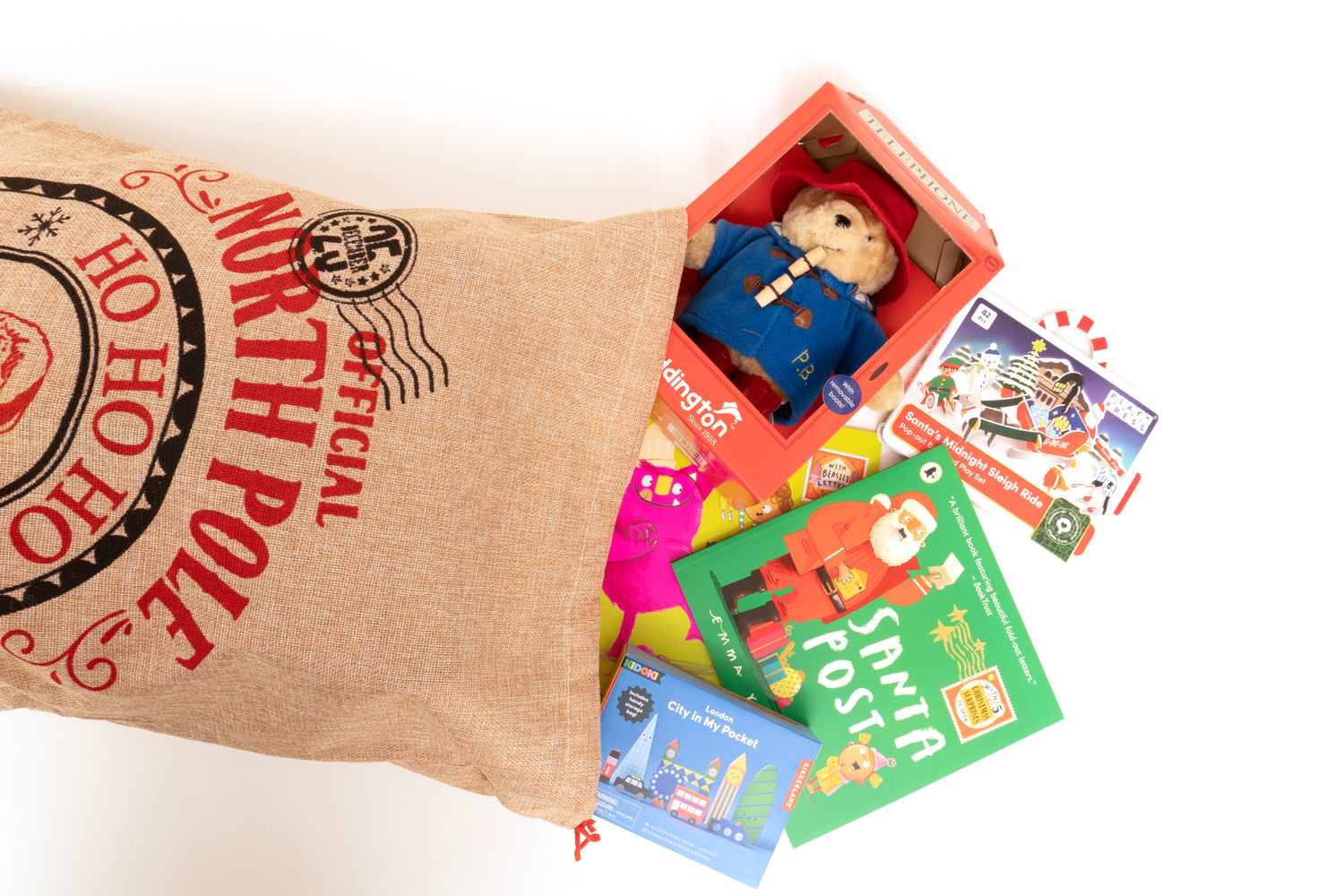 North Pole Themed hessian Sack shown on its side with presents spilling out. 