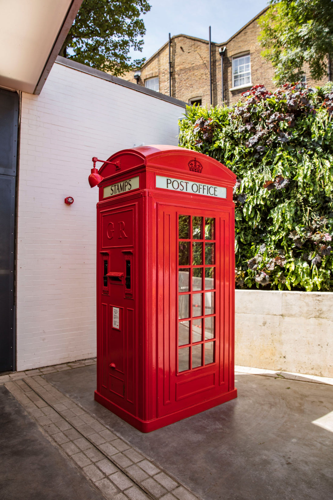 Postbox in the museum courtyard Postcard